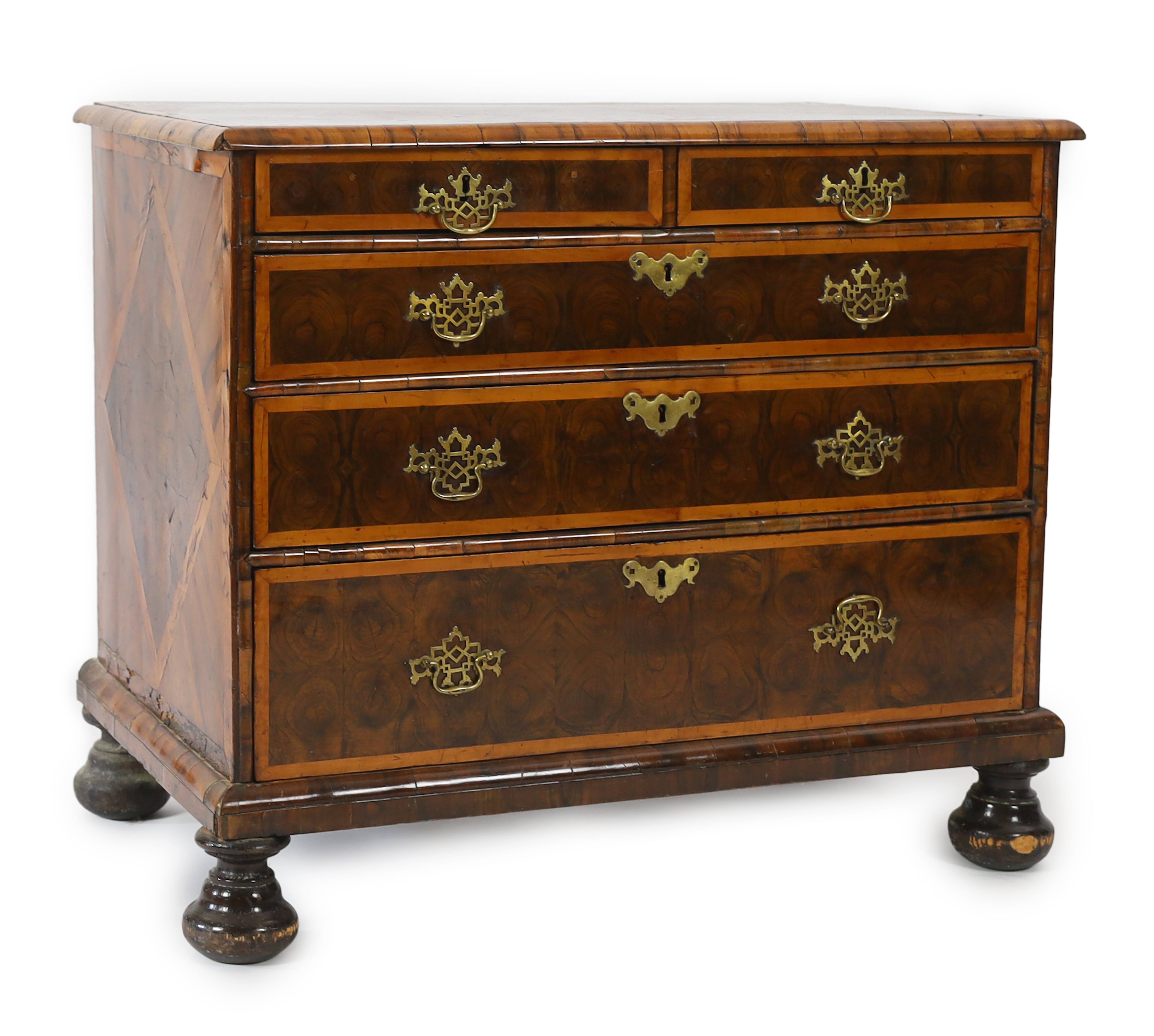 A William and Mary oyster veneered laburnum and walnut chest